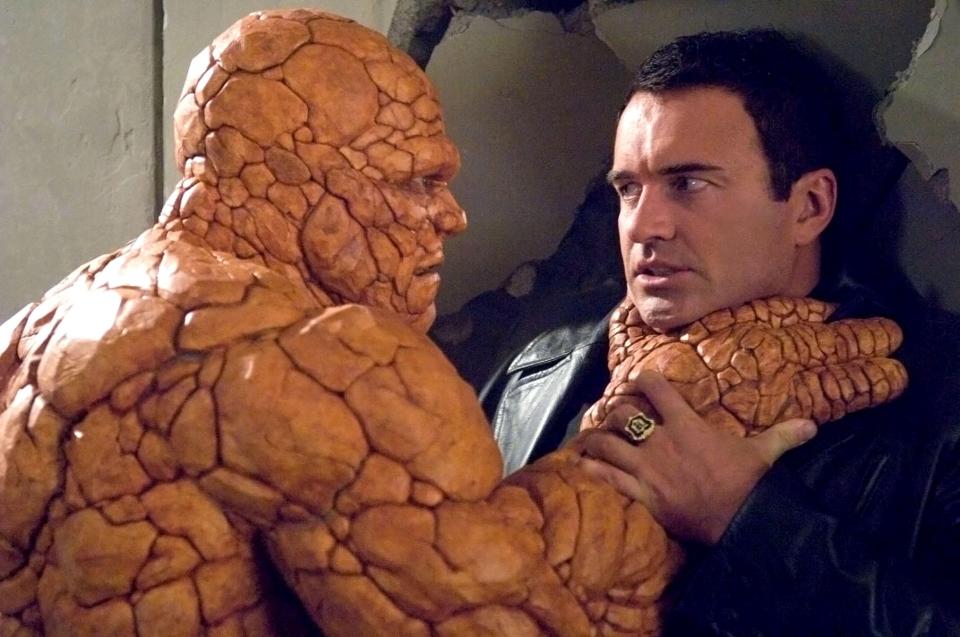 The Thing choking a man in Fantastic Four: Rise of the Silver Surfer.