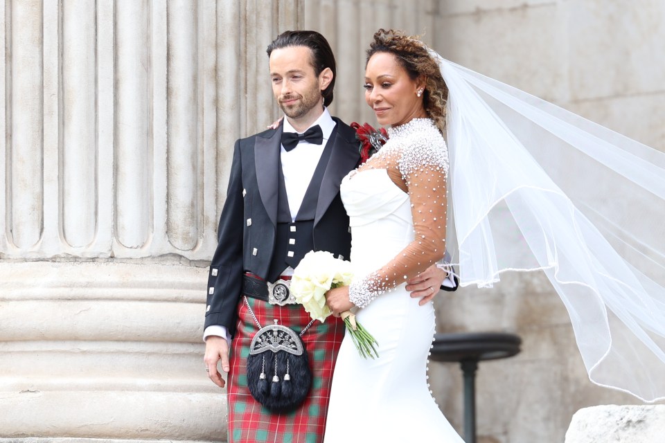 Mel B and her husband leaving St. Paul's Cathedral after their wedding.