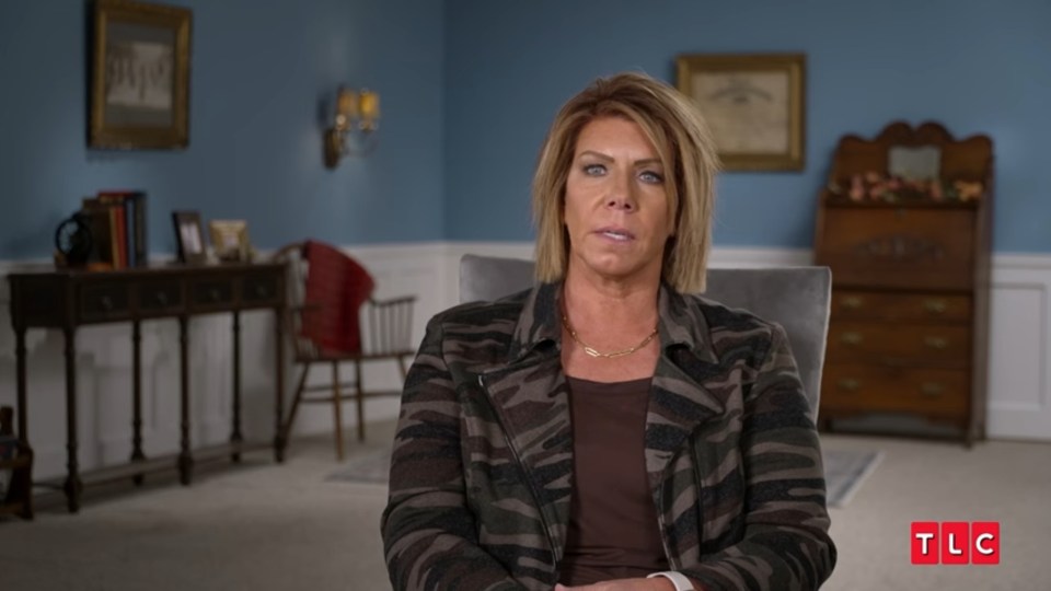 Meri Brown in a camo jacket during an interview.