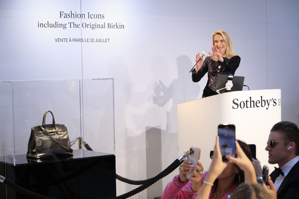 Auctioneer Aurélie Vandevoorde at Sotheby's auction of Jane Birkin's bag.