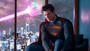 Superman unwinds after a rough day, while the Justice Gang battles outside.
