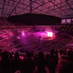 SoFi Stadium lights up pink for Blackpink's first U.S. concert in two years.
