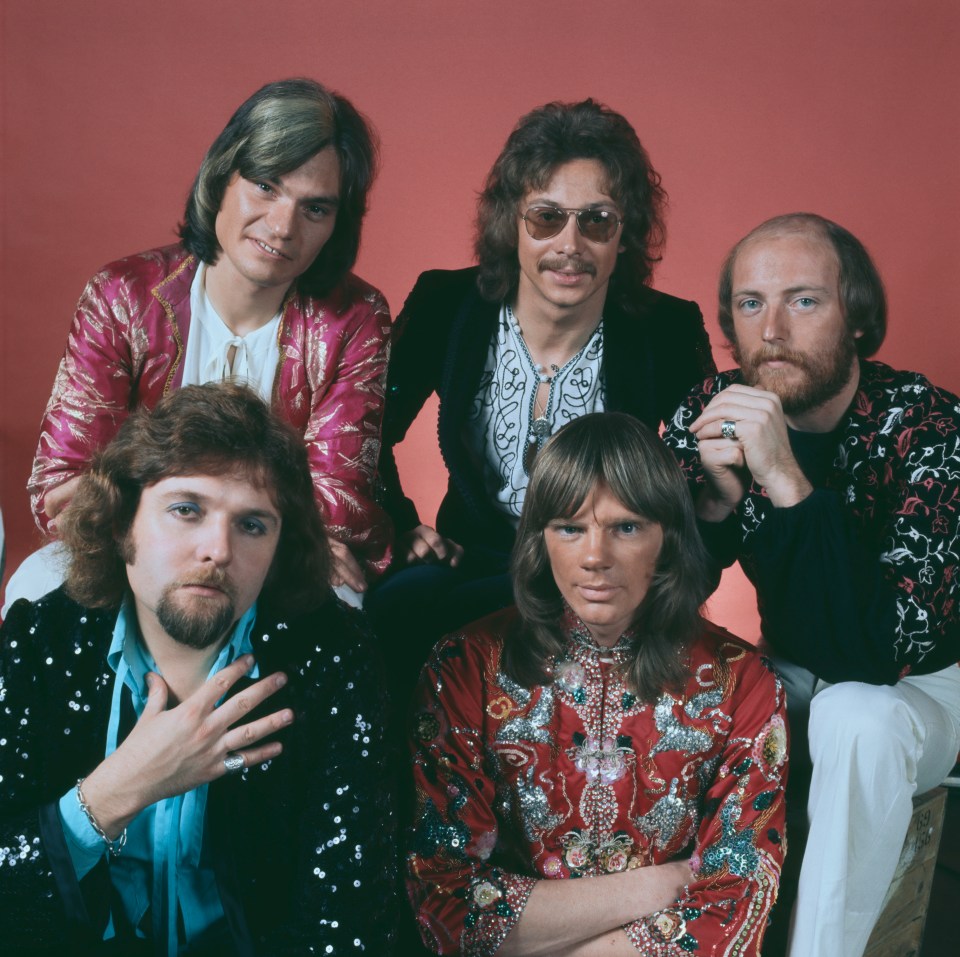 Studio portrait of the English folk rock band Strawbs.