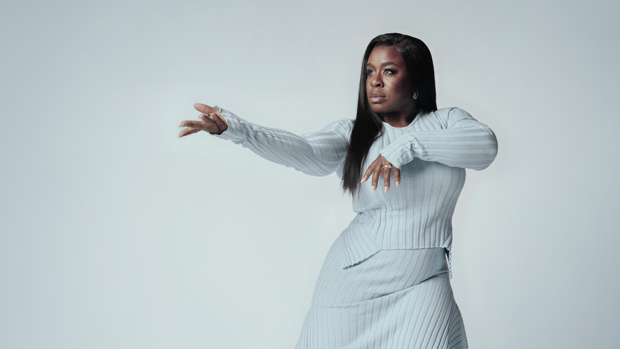 Uzo Aduba strikes a tai chi pose