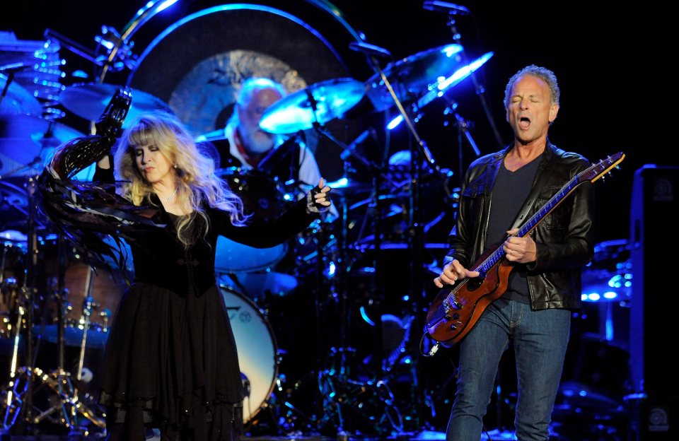 Stevie Nicks and Lindsey Buckingham of Fleetwood Mac performing on stage.