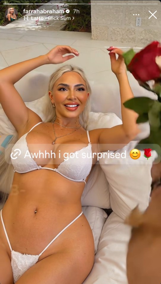 Farrah Abraham surprised with roses while wearing a white lace bra and thong.