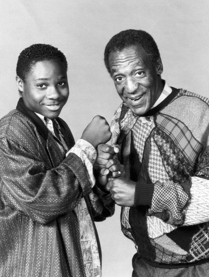 Black and white photo of Malcolm-Jamal Warner and Bill Cosby from *The Cosby Show*.