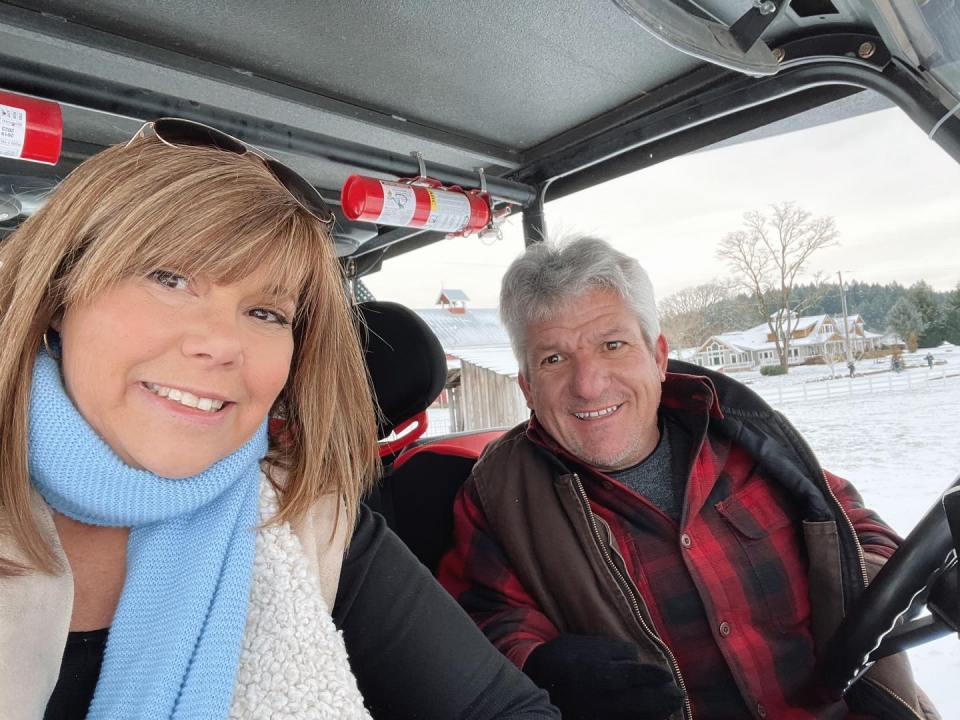 Matt Roloff and Caryn Chandler in a vehicle in the snow.