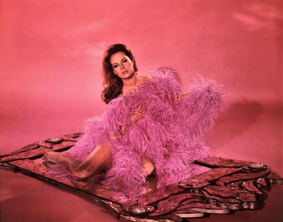 Luciana Paluzzi in a pink feather boa, publicity still for The Venetian Affair.
