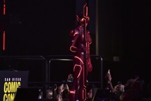 A person in a glowing Tron costume