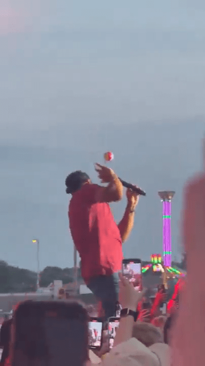 Luke Bryan hit in the face by a flying object during a performance.