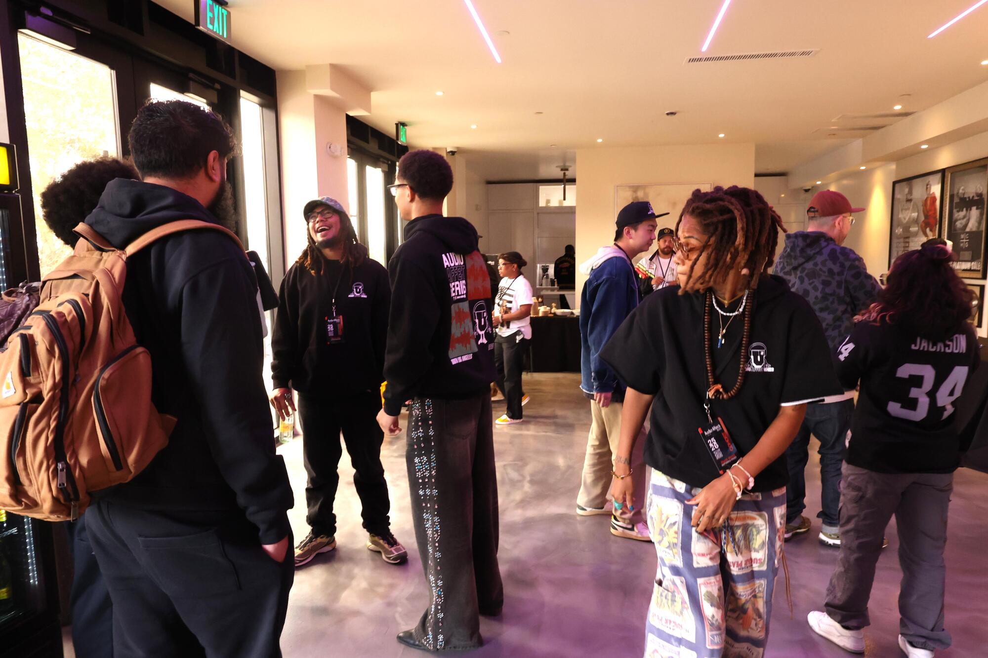 Young producers hanging out and listening to music