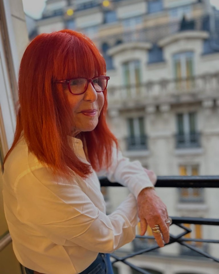Sally Jessy Raphael on a balcony.