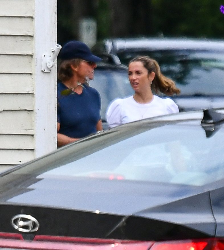 Tom Cruise and Ana de Armas walking together.