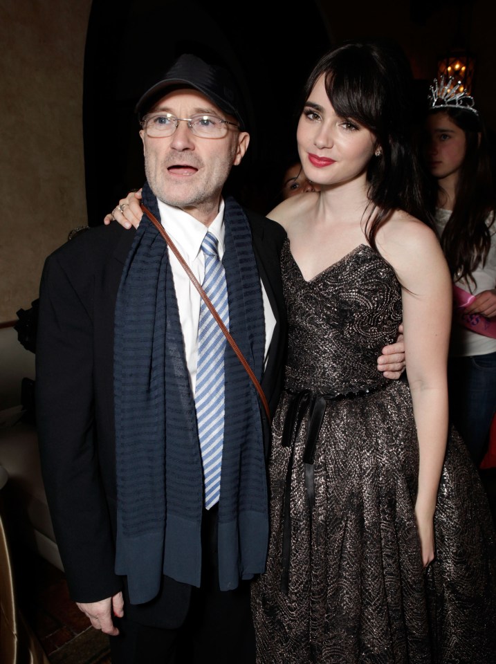 Phil Collins and Lily Collins at an after-party.