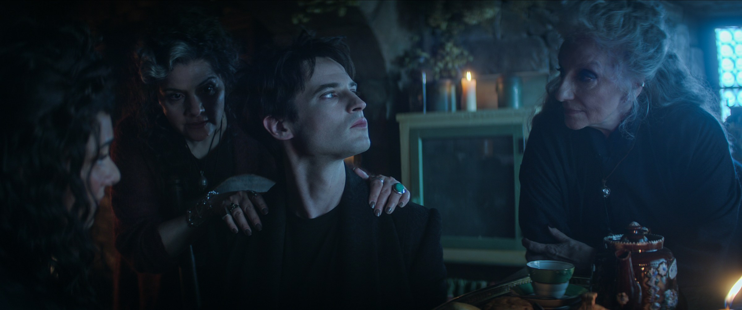 Tom Sturridge as Dream visits the home of Dinita Gohil as The Maiden, Nina Wadia as The Mother, and Souad Faress as Crone to negotiate his fate in The Sandman