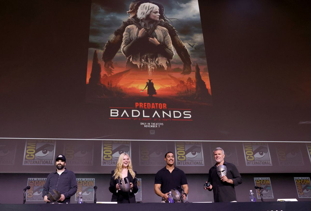 Dan Trachtenberg, Elle Fanning, Dimitrius Schuster-Koloamatangi, and Alec Gillis participate in the Predator: Badlands panel in Hall H at San Diego Comic Con on July 25, 2025 