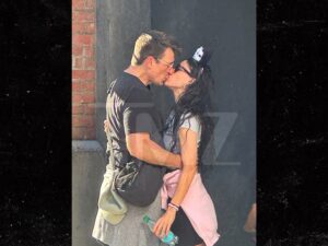 Nathan Fillion and Tania Raymonde at Disneyland tmz 3