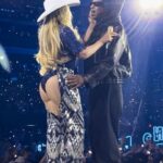 
Superstar couple Beyoncé and Jay-Z exchange a quick kiss on stage during the last night of the Cowboy Carter Tour at Allegiant Stadium in Las Vegas.