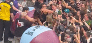 Jason Momoa in a mosh pit at a Black Sabbath concert.
