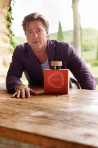 Brad Pitt with Le Domaine skincare product.
