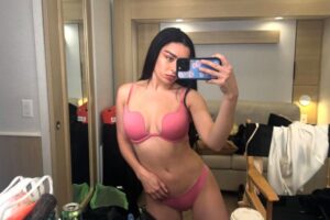 charli-xcx-models-matching-pink-set-in-mirror-selfie