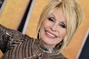 Dean, who inspired one of Parton's most iconic song, "Jolene," died in March. He was 82.
