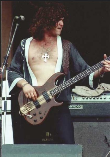 Kevin Riddles of Legendary Angel Witch playing bass guitar.