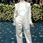 Madonna at the Met Gala in a light beige suit.