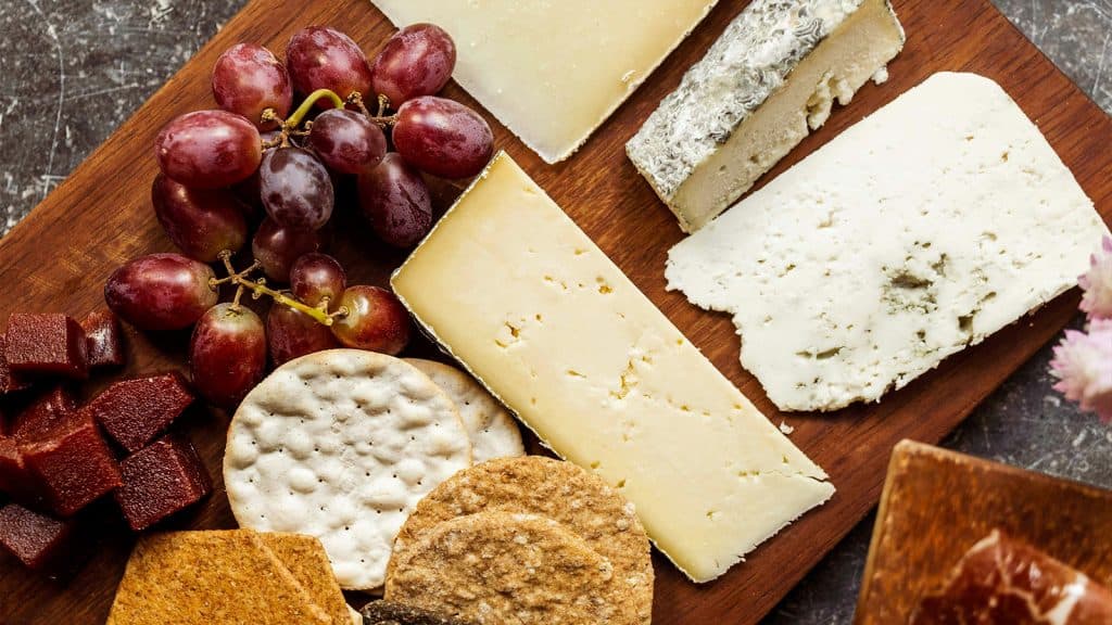 picture of cheese with grapes