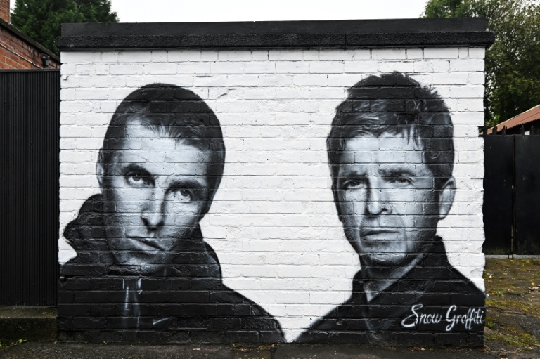 A Manchester mural by artist Snow Graffiti of Liam (left) and Noel Gallagher of Oasis