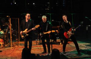 The Steve Miller Band performing on stage.