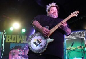 Jaret Reddick of Bowling for Soup performing on stage.