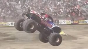 Rogue monster truck wheel destroys cars in parking lot after event goes awry