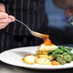Chef plating food