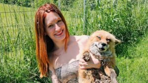 Mikayla Raines holding a fox