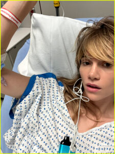 Suki Waterhouse in hospital bed after hernia surgery