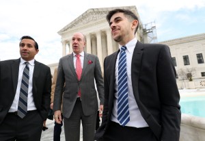 Lawyer and transgender rights activist Chase Strangio (R) leaves the U.S. Supreme Court after arguing a transgender rights case before the high court on December 4, 2024 in Washington, DC.