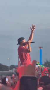 Luke Bryan performing on stage.