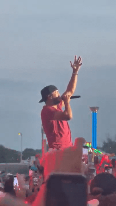 Luke Bryan performing on stage.