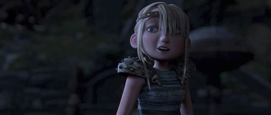 Astrid in the original animated 2010 How to Train Your Dragon looks puzzled as she walks through her village at night and sees Hiccup acting even weirder than usual