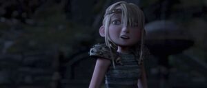 Astrid in the original animated 2010 How to Train Your Dragon looks puzzled as she walks through her village at night and sees Hiccup acting even weirder than usual