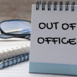 vacation-out-of-office-text-on-white-notepad