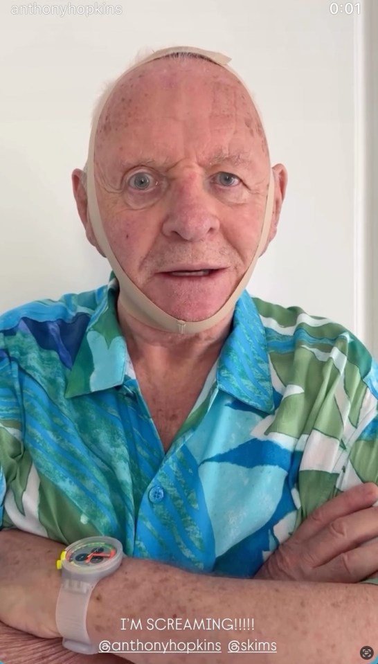 Anthony Hopkins wearing a face shaper and a colorful shirt.