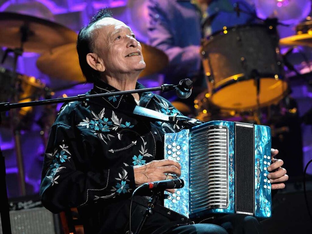 The accordion playing of Flaco Jimenez, seen here performing during the 2014 Americana Music Association Honors and Awards Show at the Ryman Auditorium in Nashville, Tenn., came to define contujo and Tejano music of South Texas over a career that spanned more than 70 years.