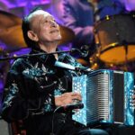 The accordion playing of Flaco Jimenez, seen here performing during the 2014 Americana Music Association Honors and Awards Show at the Ryman Auditorium in Nashville, Tenn., came to define contujo and Tejano music of South Texas over a career that spanned more than 70 years.