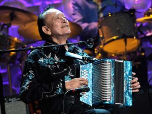 The accordion playing of Flaco Jimenez, seen here performing during the 2014 Americana Music Association Honors and Awards Show at the Ryman Auditorium in Nashville, Tenn., came to define contujo and Tejano music of South Texas over a career that spanned more than 70 years.