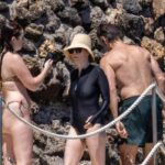 Julianne Moore, Bart Freundlich, and their daughter Liv Freundlich on a beach in Grosseto, Italy.