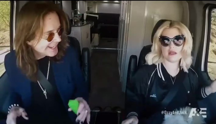 Kelly and Jack Osbourne in a camper van.