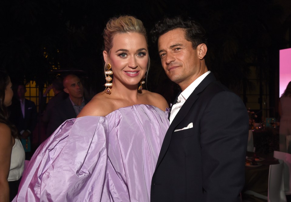 Katy Perry and Orlando Bloom at an event.